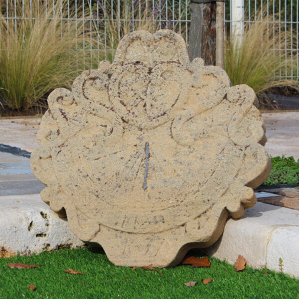 antique style sundial in limestone
