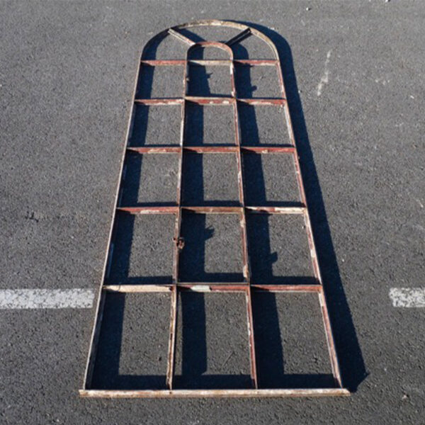 antique arched metal window