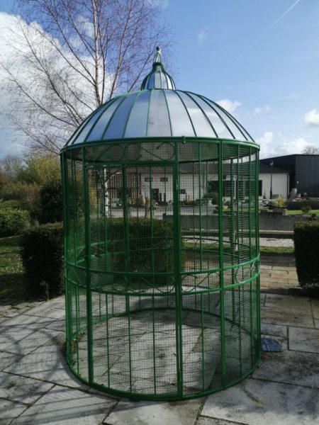 gazebo birdcage in green color in dormed grey roof