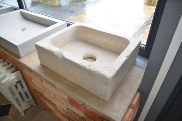antique sink in french limestone