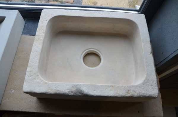 antique sink in natural stone