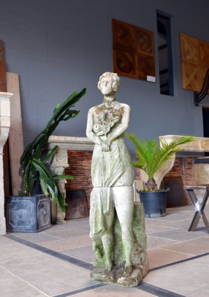 women with flowers statue for decoration