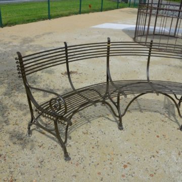 brown curved bench for garden