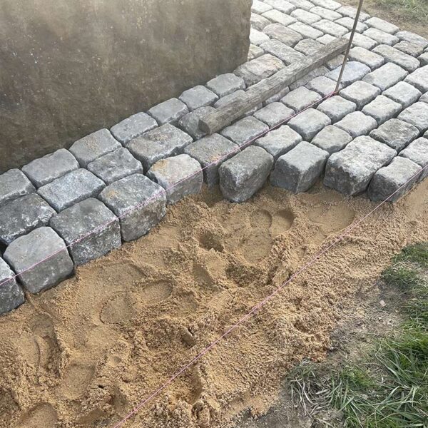 laying antique granite cobblestones