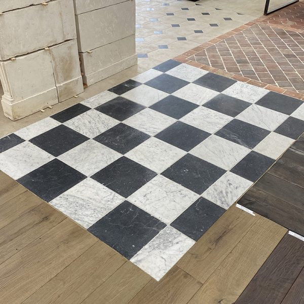 Marble checkerboard tiles white and black