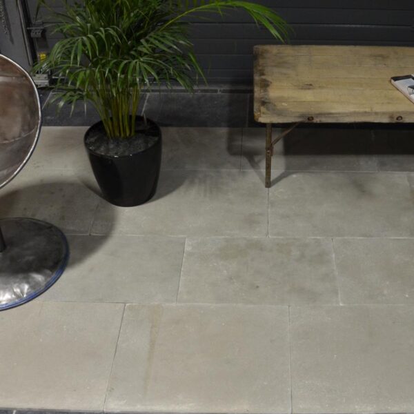 New antiqued limestone Grey