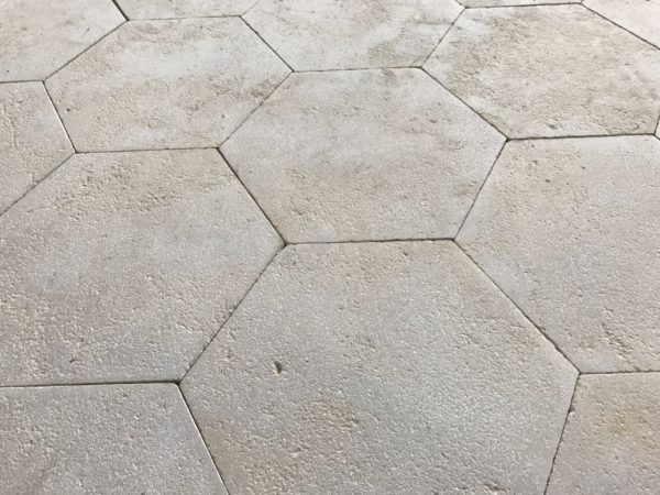 Reclaimed limestone hexagon tiling