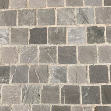 grey khandla pavers outside in front of house