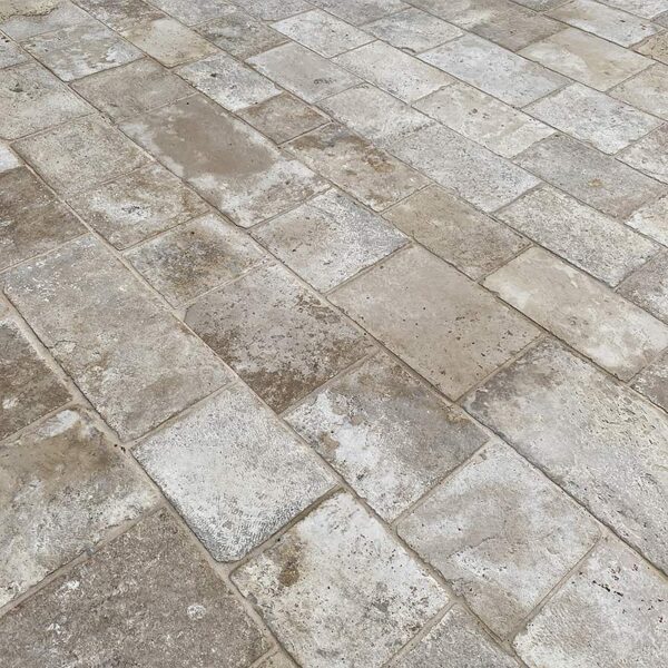 Light and dark beige outdoor paving