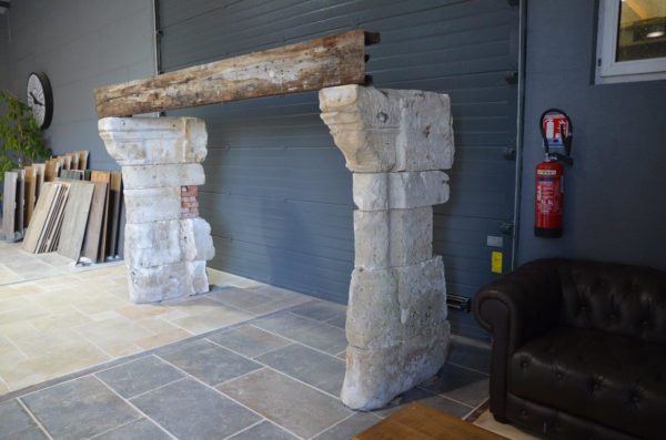 antique oak fireplace with limestone