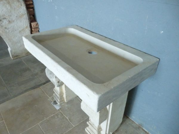 beige washbasin for house in limestone