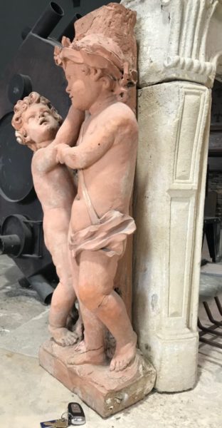 terra cotta statue of XIX century putti play