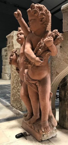 cherubs statue in terra cotta style antique