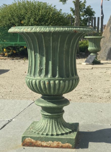 in front of our cast iron vases greek urns style