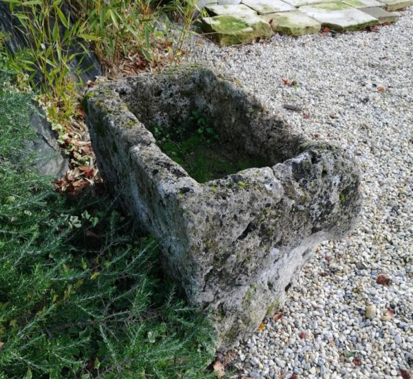 grey and white limestone trough