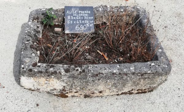 Small rectangular trough in limestone