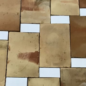 reclaimed parefeuille and glazed rectangle floor tiles