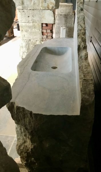 washbasin carved in boulder