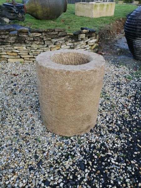 round limestone planter at bca premises