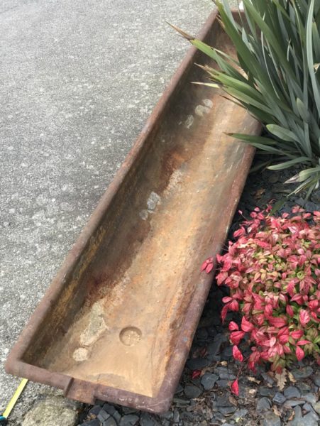antique water trough for horses