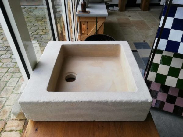 beige mera stone sink with soft finish at the left