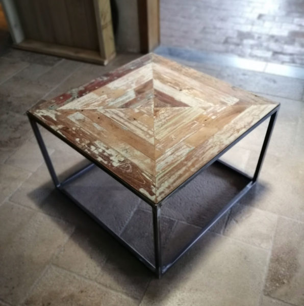 metal table with a old teak top