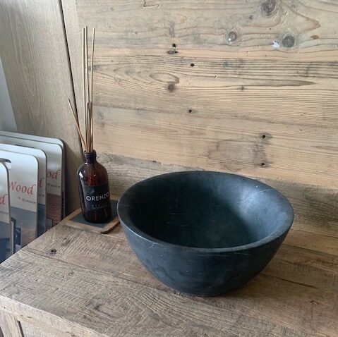 rounded blue washbasin in bathroom