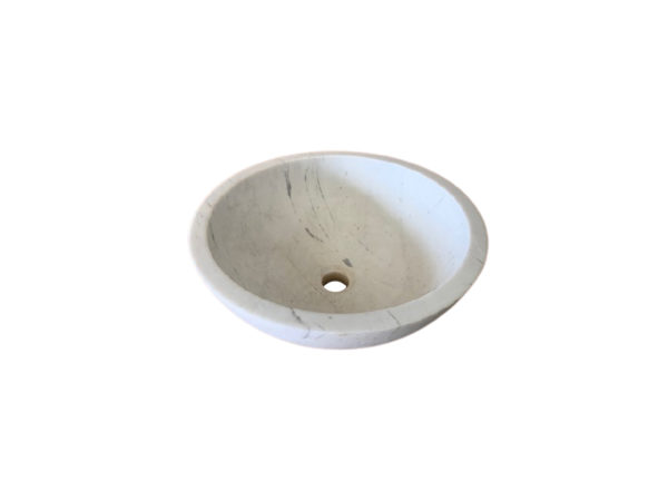 rounded white marble washbasin