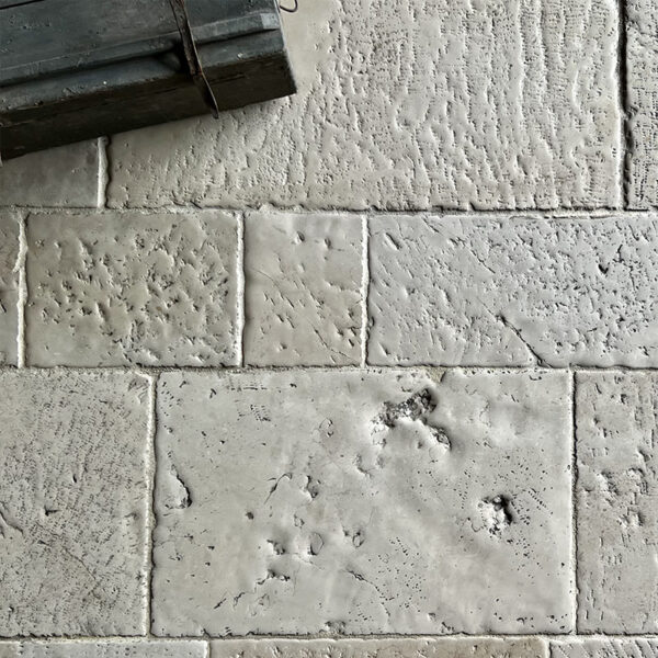 antiqued limestone floor