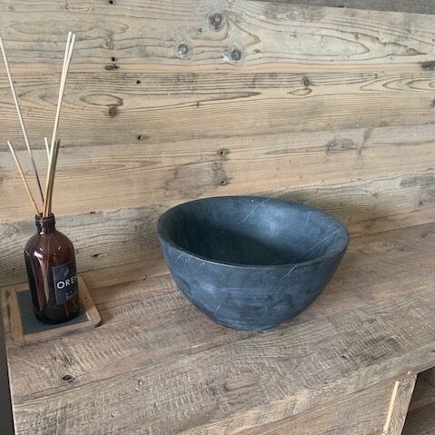 bluestone washbasin inside a bathroom