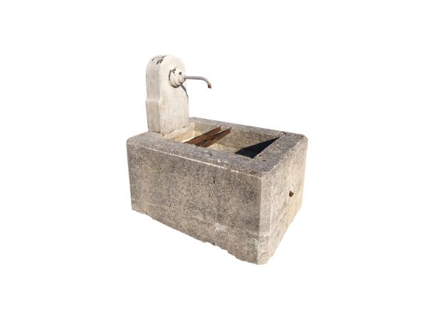 Antique small fountain with spout