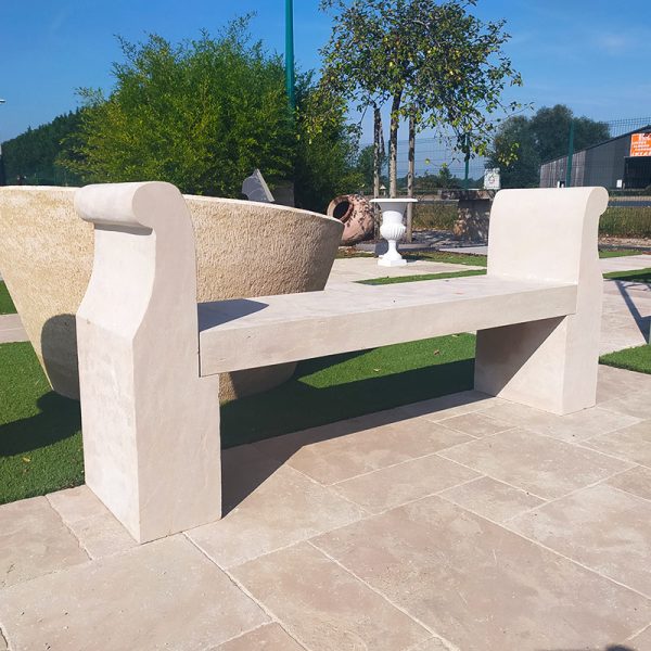 Beige limestone bench