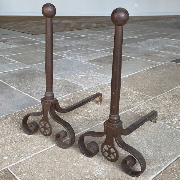 Antique forged andirons at BCA