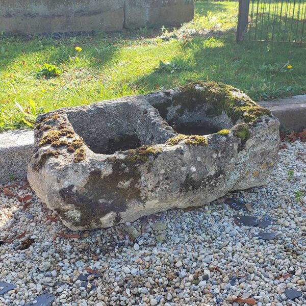 antique small trough in patinated stone