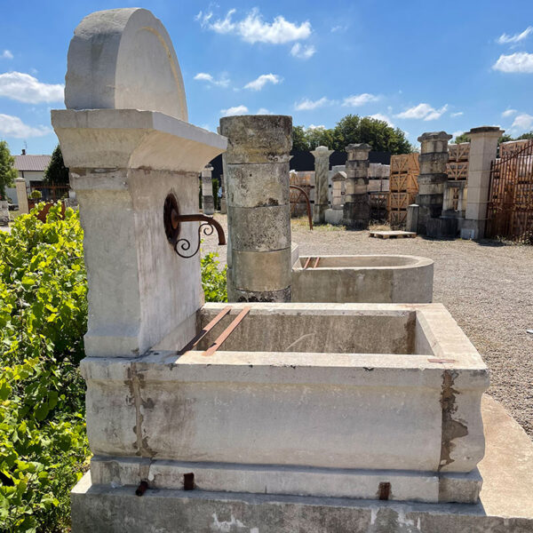 Architectural salvage fountain in limestone