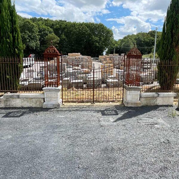 Monumental antique limestone and wrought iron entrance