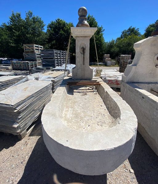 Monumental fountain with water spout