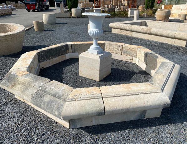 Old antique pool with new vase