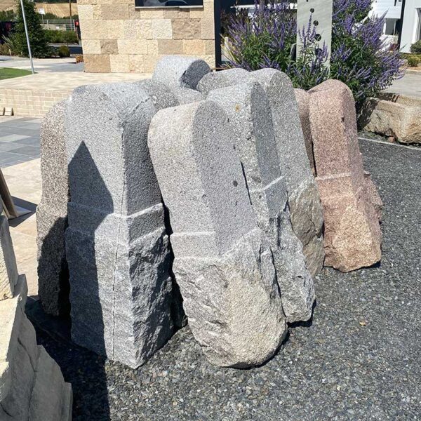 Antique grey bollards in granite