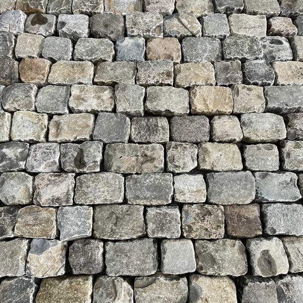 Mix of gritstone pavers or cobbles