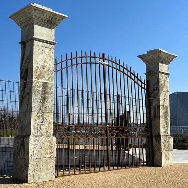 Monumental limestone gate pillars home
