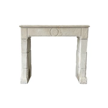 Antique charente limestone fireplace