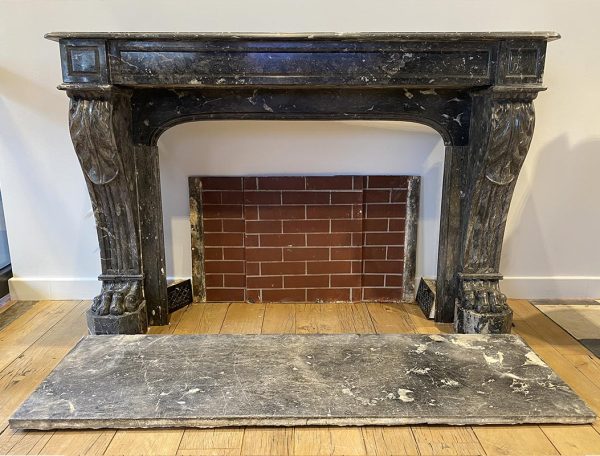 Grey and black marble fireplace