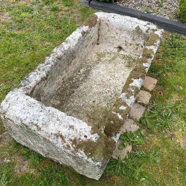 Heavyweight antique limestone horse trough exterior