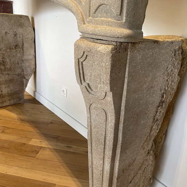 Carved jambs of the fireplace