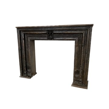 Antique carved wood fireplace