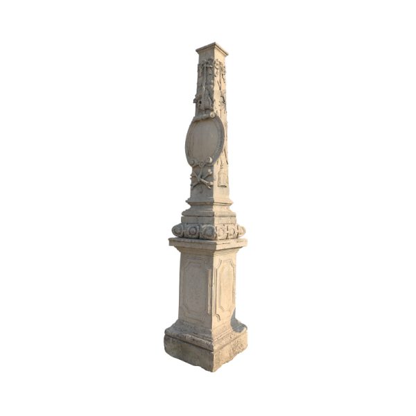 Antique stone obelisk on pedestal