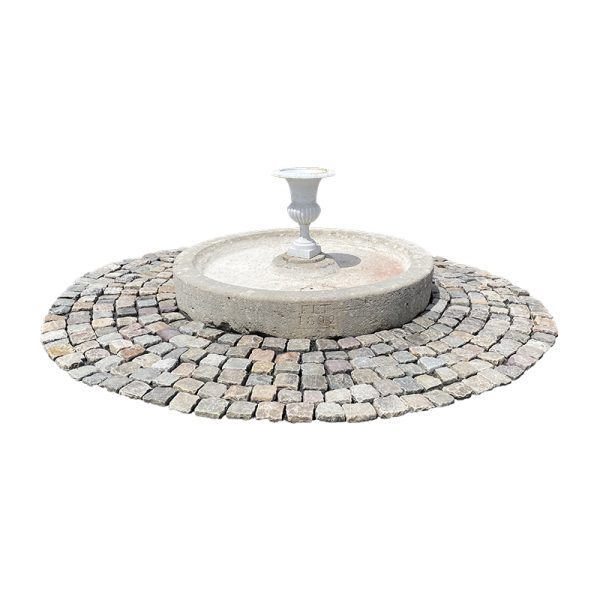 Circular antique shallow stone pool with Medicis vase