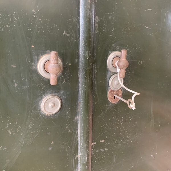 Zoom on the doors of the metal cupboard bank