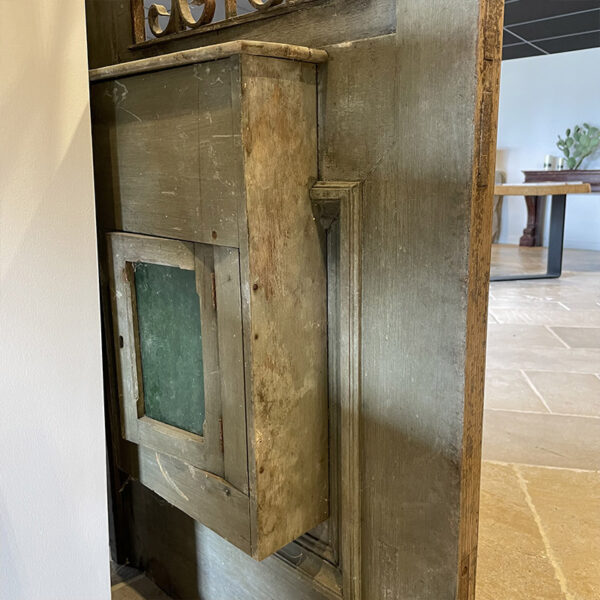 Behind the antique doors